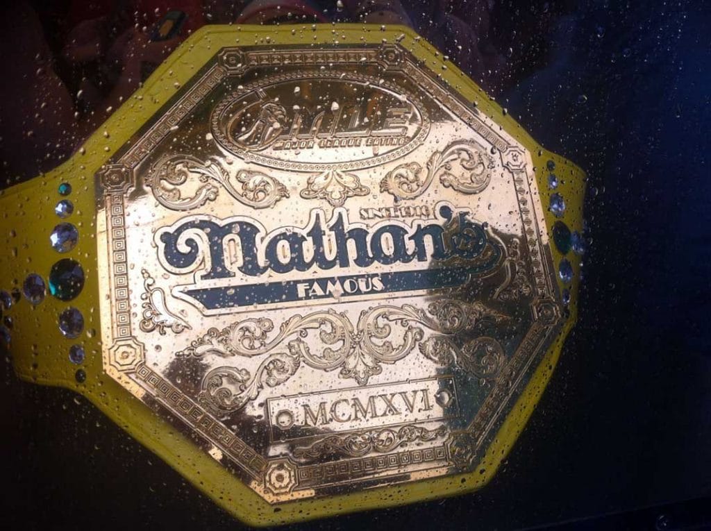 Competitive eaters vie to win the acclaimed Nathan's Famous Hotdogs belt.